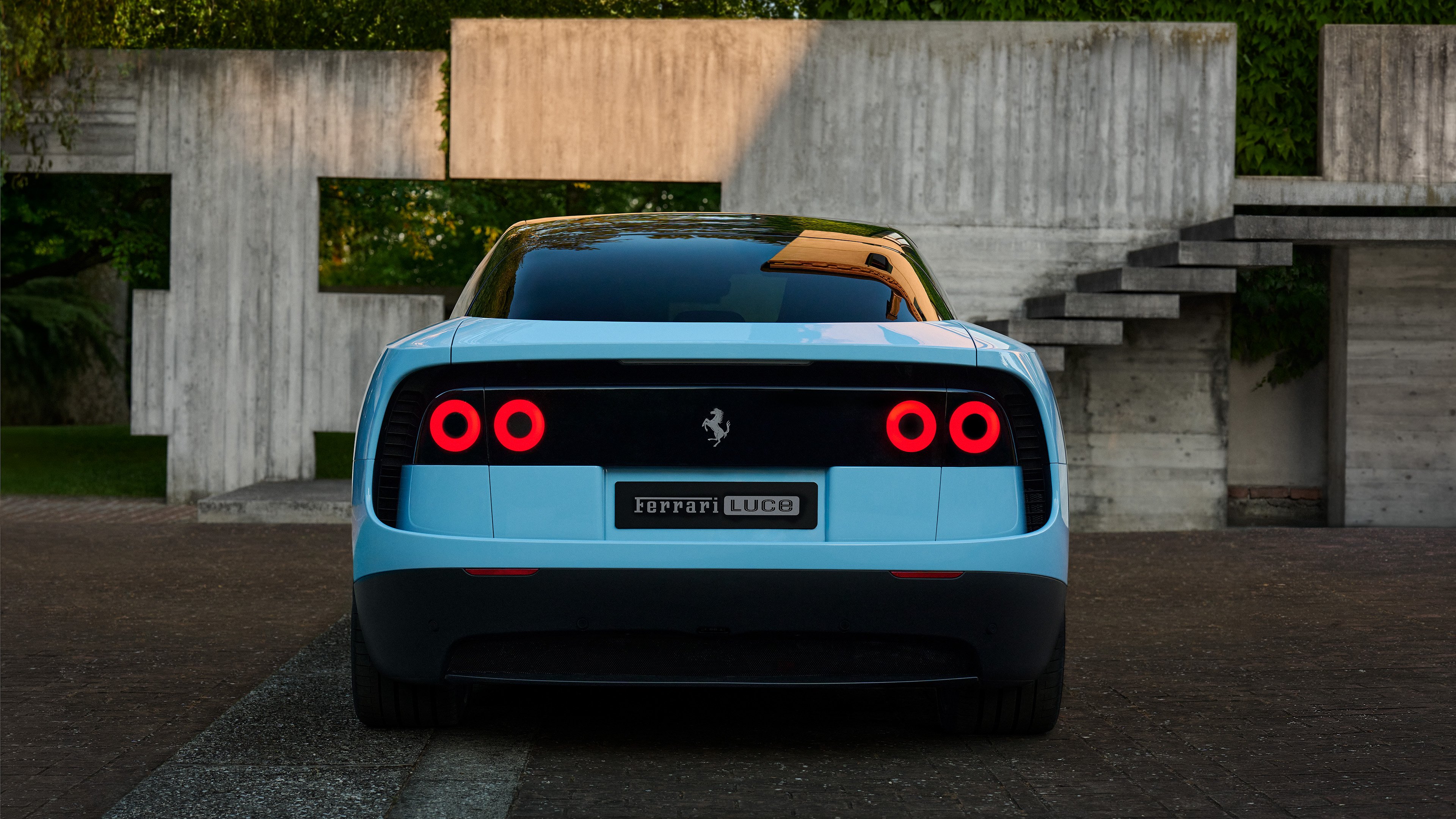 Ferrari Luce 2026 fanali rotondi posteriori omaggio 360 Modena 458 Italia