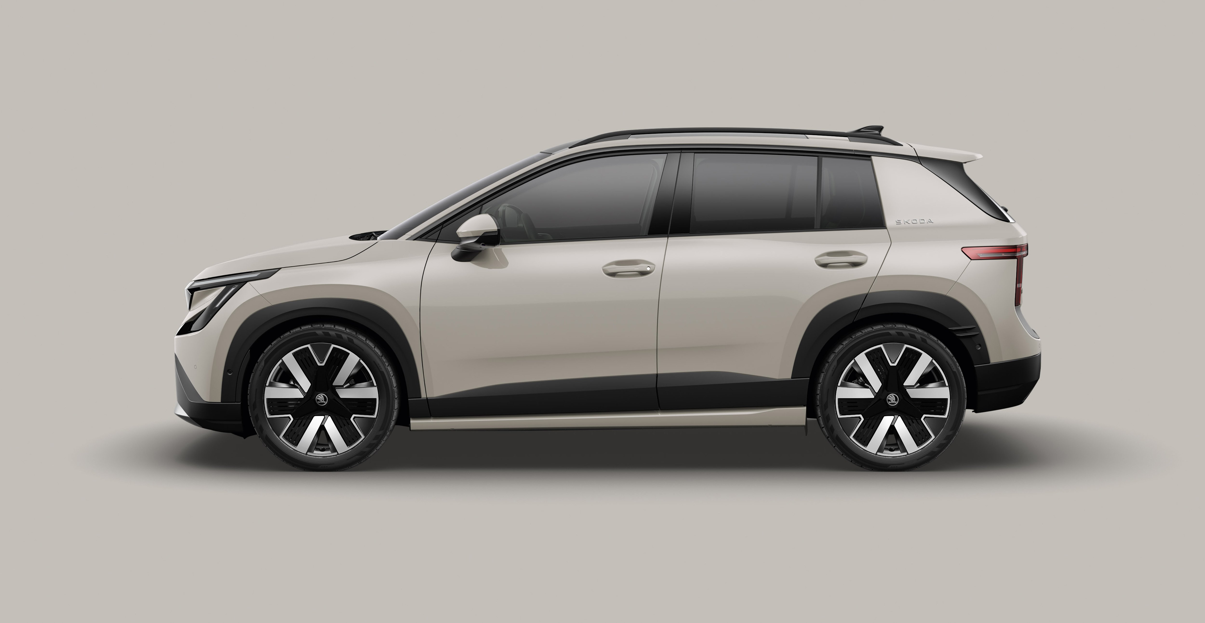 Skoda Epiq 2026 vista laterale studio color sabbia champagne B-SUV elettrico